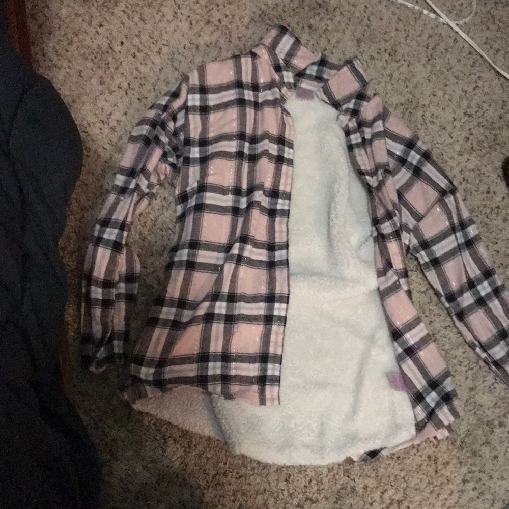 Pink plaid flannel with thick fluffy Sherpa back never been used